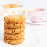 A stack of five gluten free Anzac biscuits.