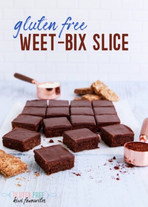16 squares of slice on a grey-blue background, text reads "gluten free weetbix slice".