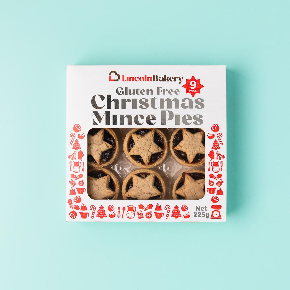 A small box of 9 Lincoln Bakery gluten free fruit mince pies on a mint green background.