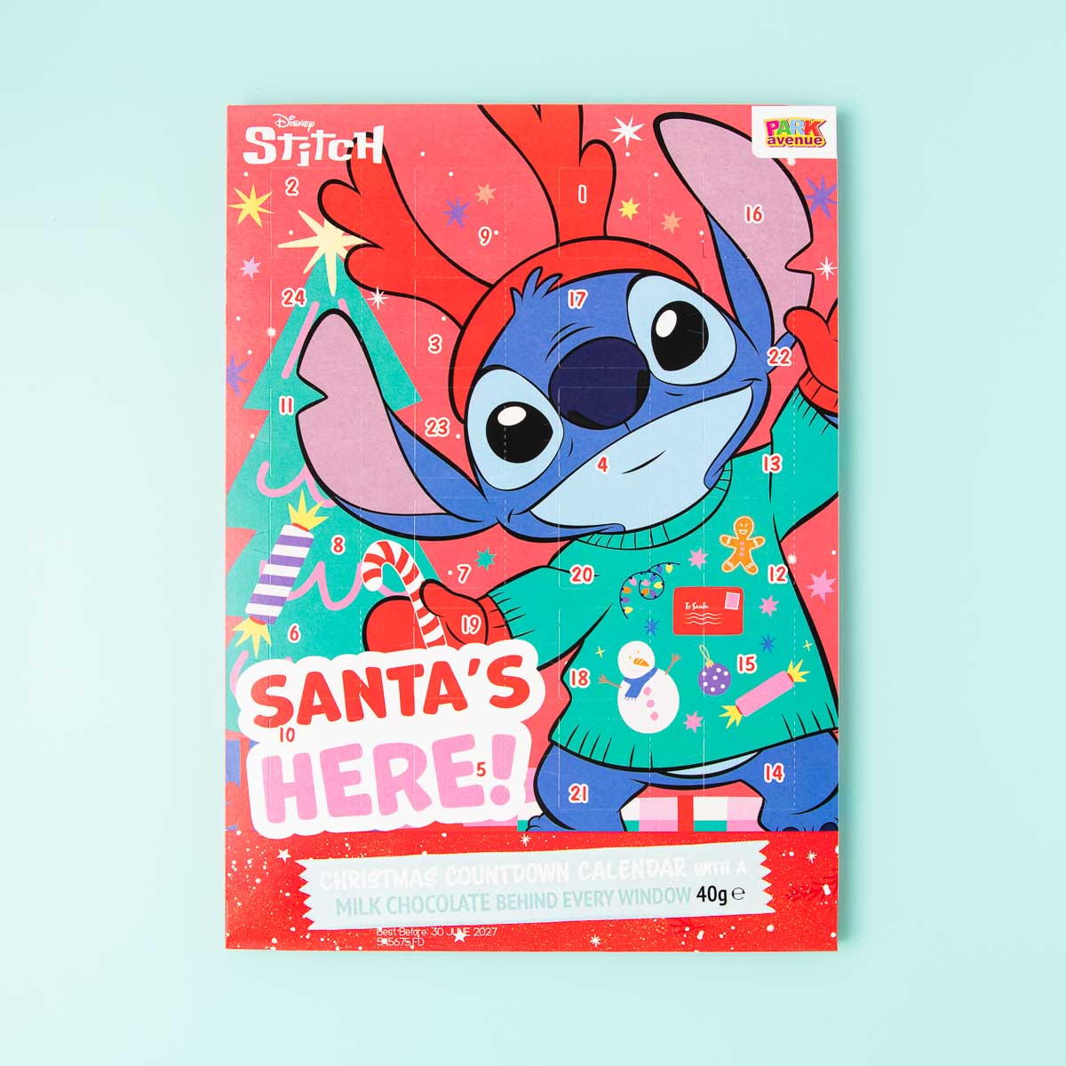 A Park Avenue brand Christmas Advent calendar. The calendar has a large picture of Stitch from Lilo and Stitch, wearing a Christmas tshirt.
