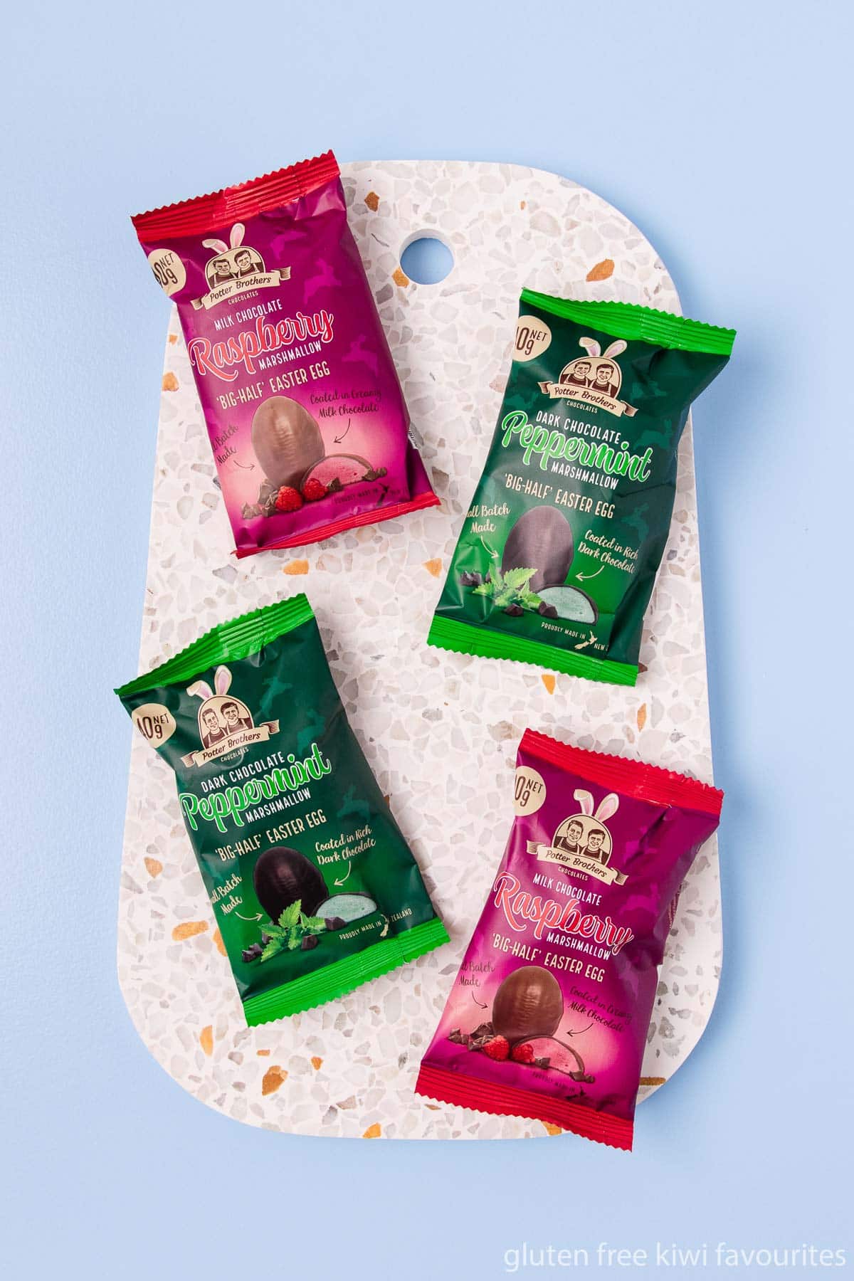 Two each of the Potter Brothers dark chocolate peppermint and milk chocolate raspberry marshmallow half-eggs. 