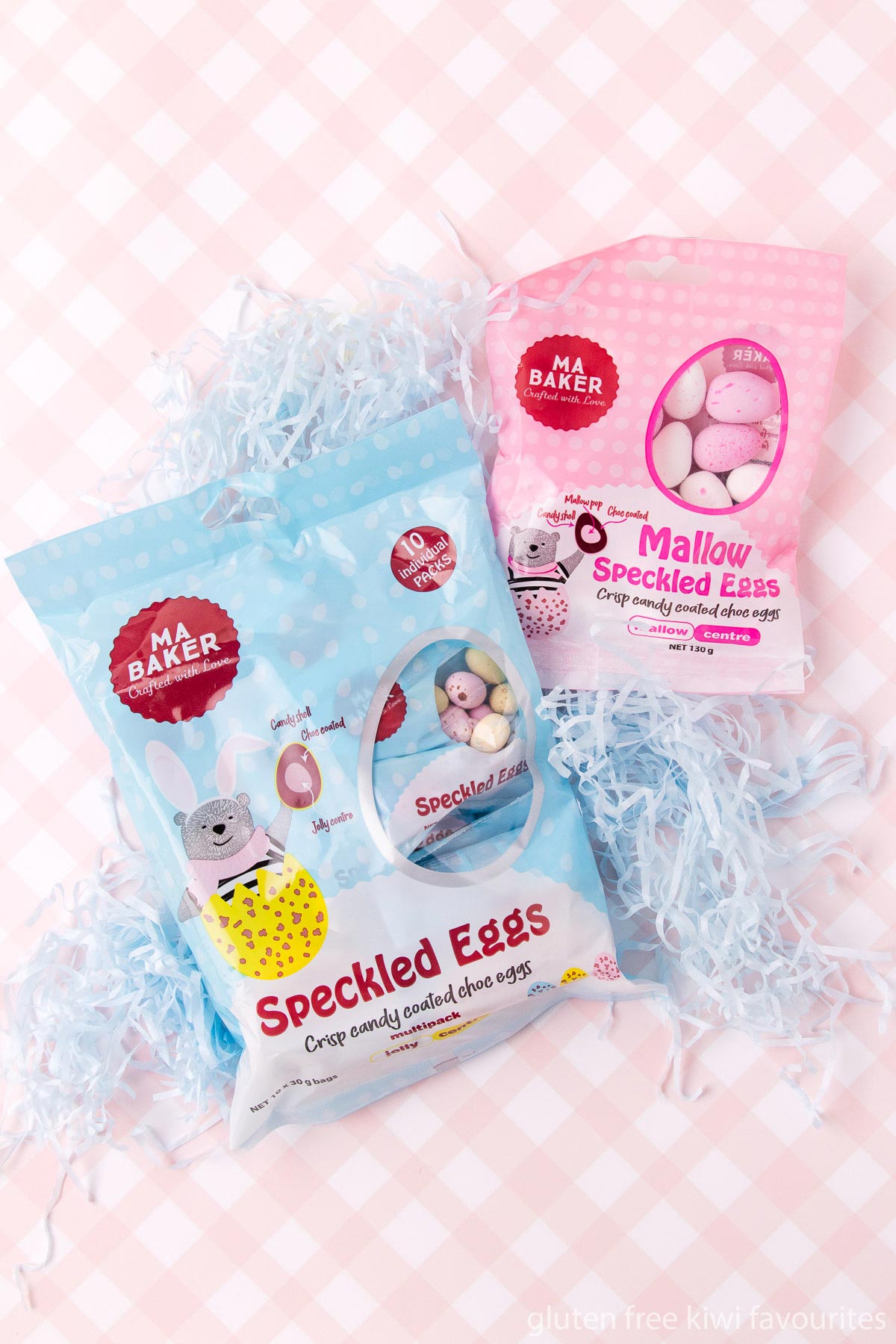 A bag of Ma Baker Speckled eggs and Mallow Speckled eggs, on a pink and white checked background.